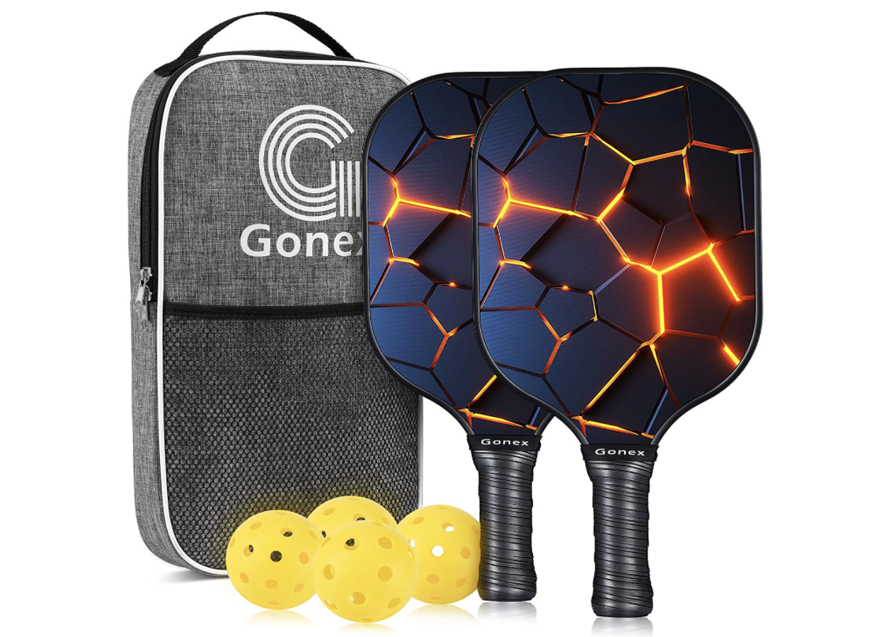 Two pickleball paddles with ball and bag.