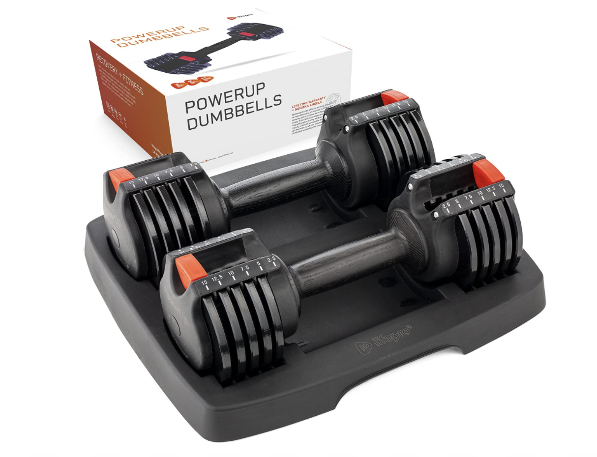 PowerUp dumbbells box and weights in stand. 